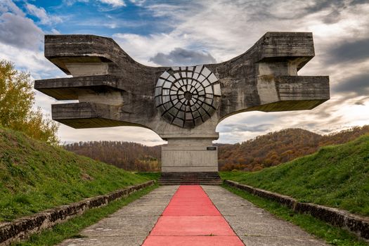 Spomenik revolucije at Podgarić in Croatia under a dramatic sky.