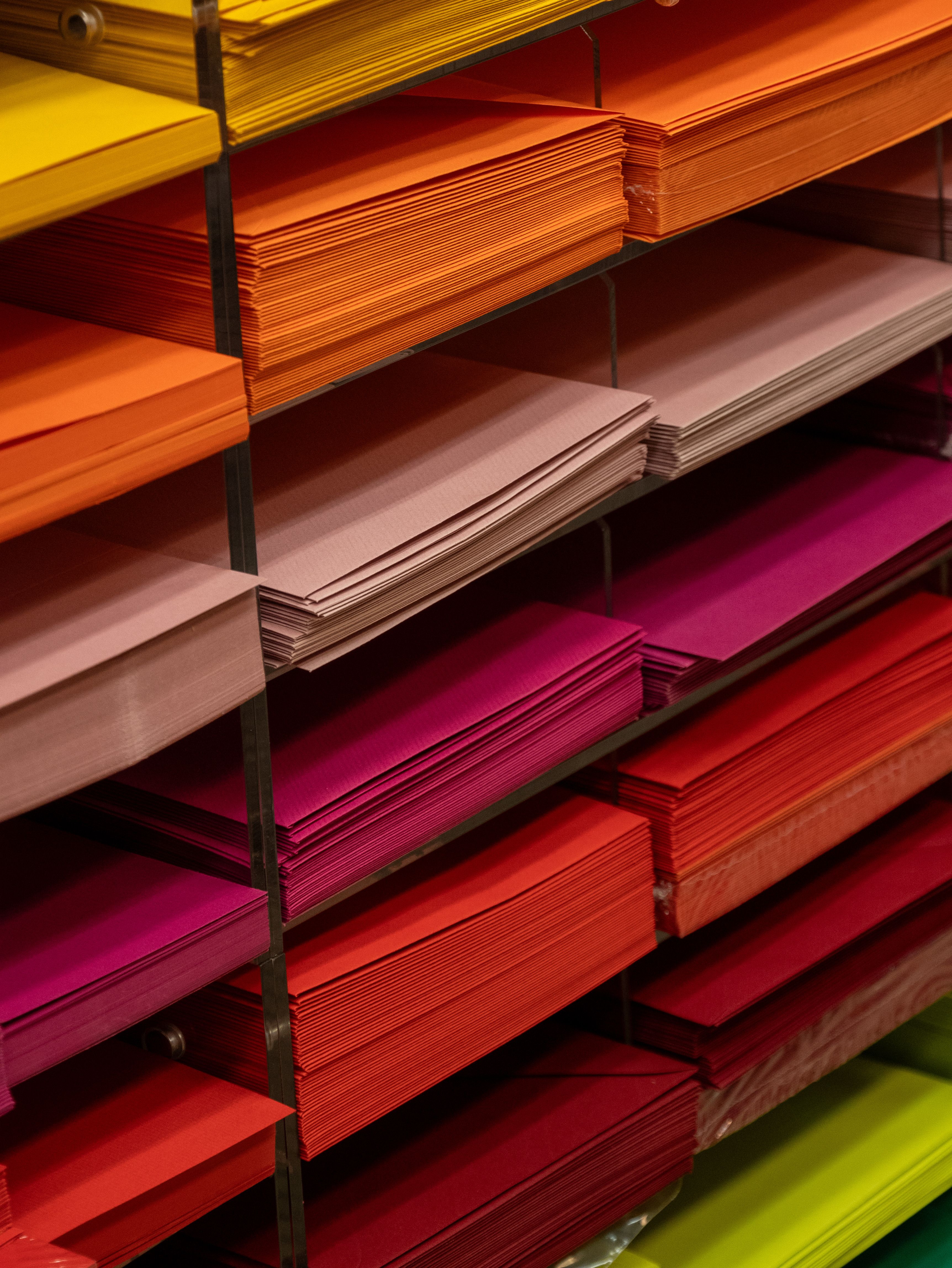 Multi Colored Folders Piled Up · Free Stock Photo