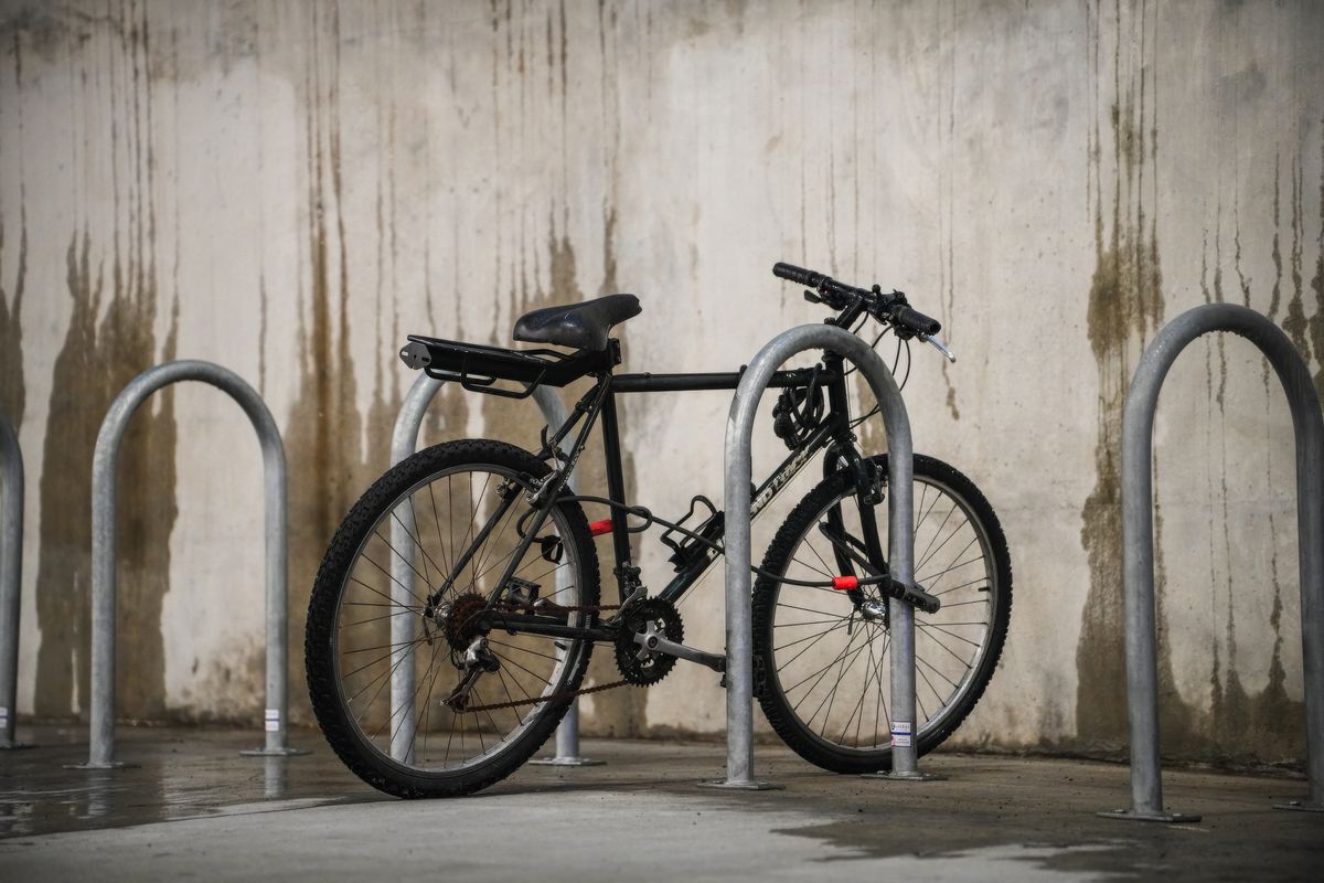 Bicycle secured at an urban bike rack