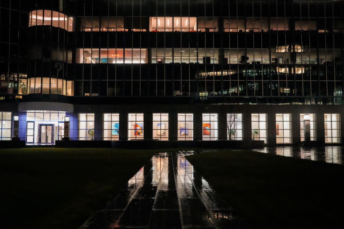 Studio entrance lit from inside after dark, photo by Cara Denison on Pexels