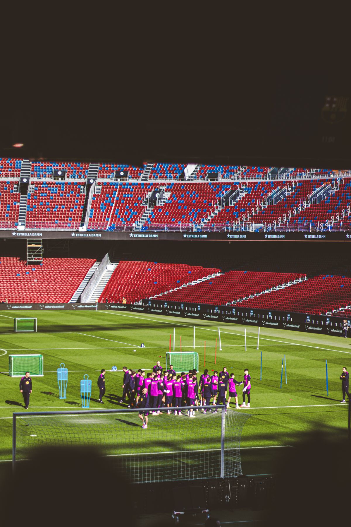 A professional football stadium with accessible seating areas and clear signage