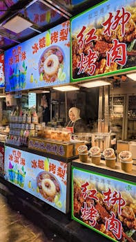 Explore authentic street food at a bustling Xi'an night market. Discover the flavors of Shaanxi cuisine.