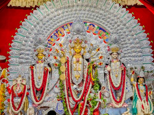 Free Intricately decorated Durga Puja pandal showcasing Hindu deities in New Delhi, India. Stock Photo
