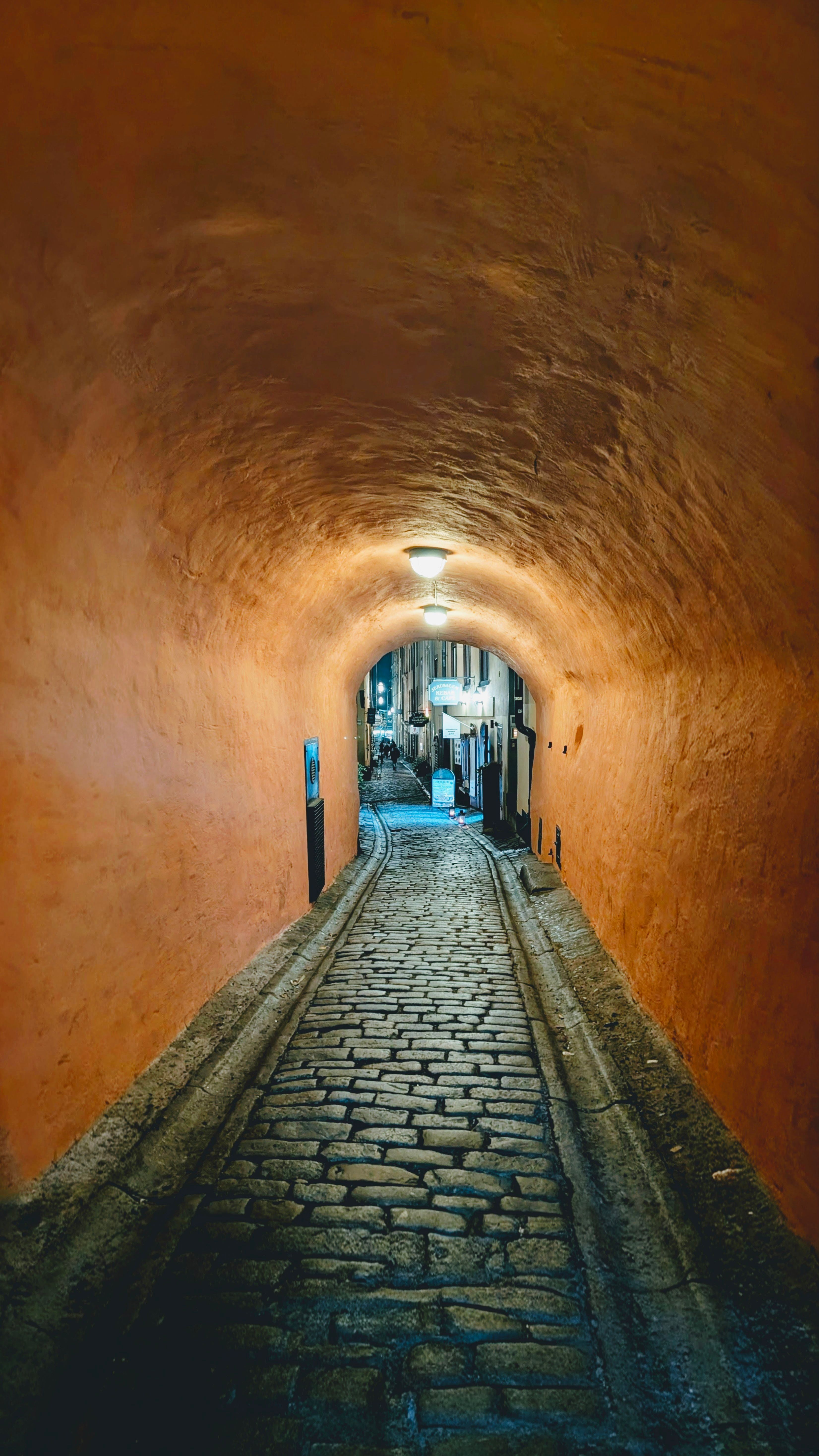 Historic Cobblestone Alley in Stockholm · Free Stock Photo