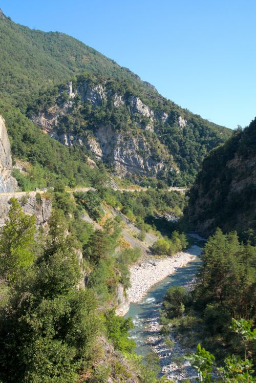Free Explore the breathtaking views of a river valley against the majestic backdrop of the French Alps. Stock Photo