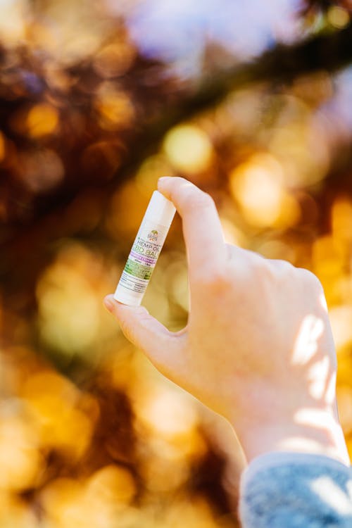 Free Person Holding CBD Product Stock Photo