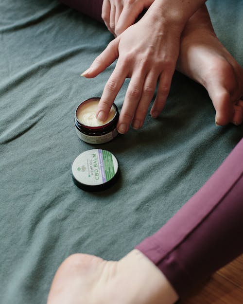 Free Person's Hand in a Wax Container Stock Photo