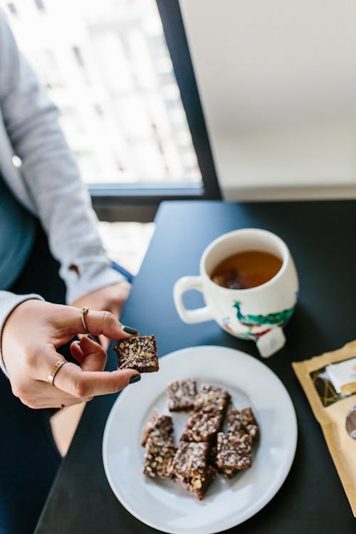 Free Person Holding Brownies Stock Photo