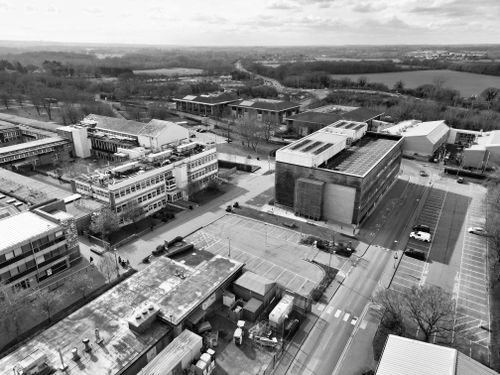 Free Black and white aerial view of contemporary campus architecture in spring. Stock Photo