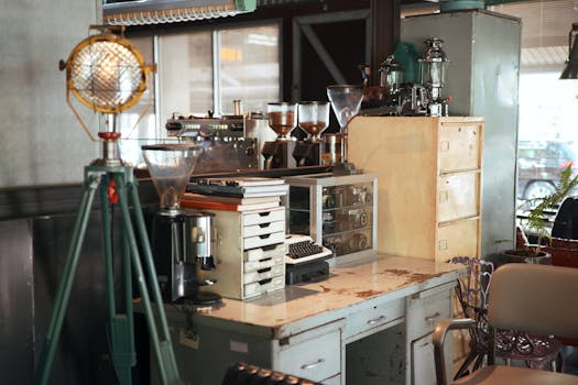 Cozy coffee shop corner with vintage decor and retro equipment, perfect for a classic vibe.