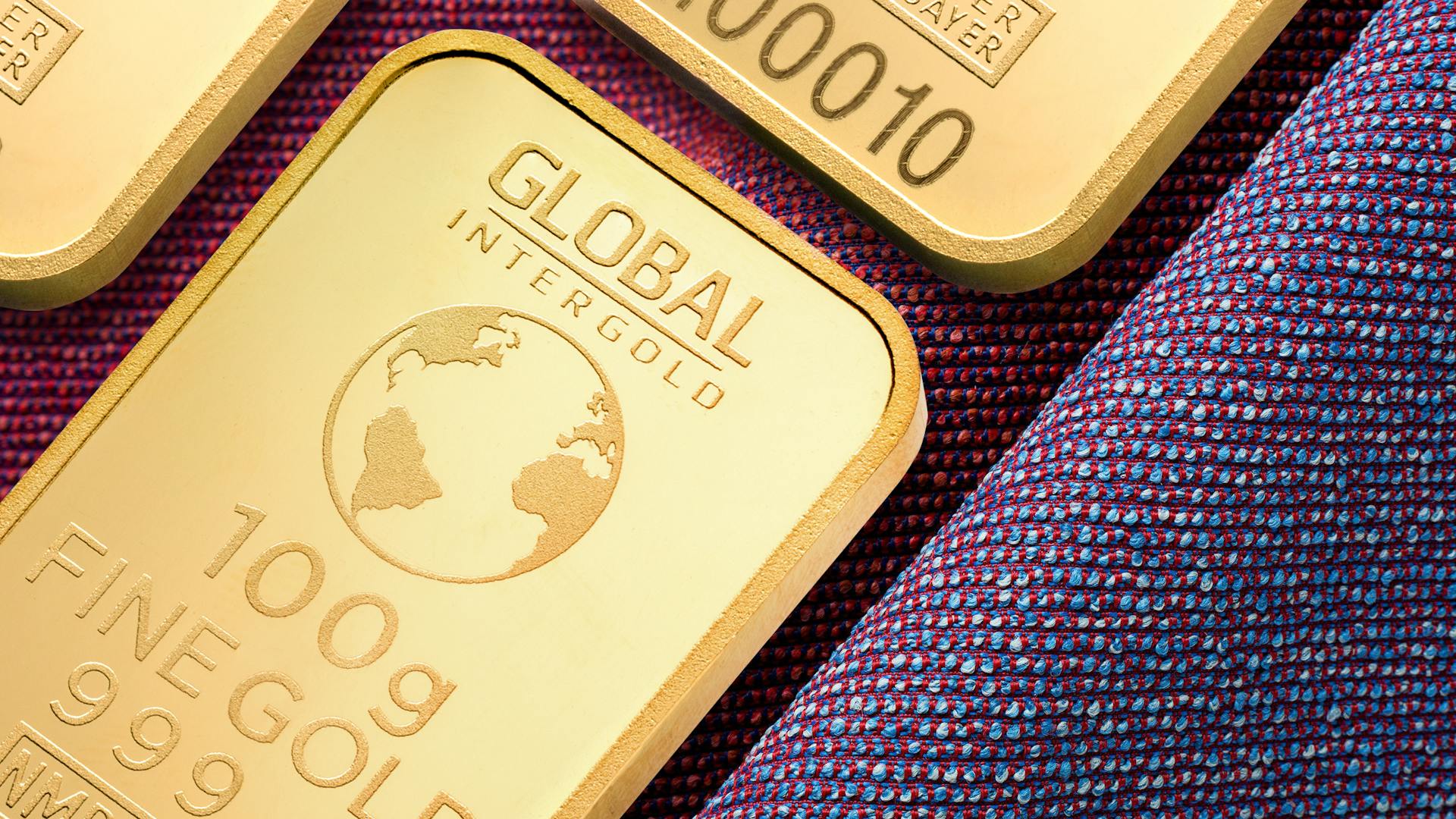 Close-up image of high-quality gold bars, symbolizing wealth and investment potential.