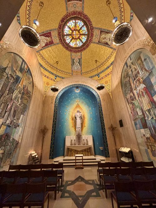 Free Capture of a historic chapel's ornate interior with stunning mosaics. Stock Photo