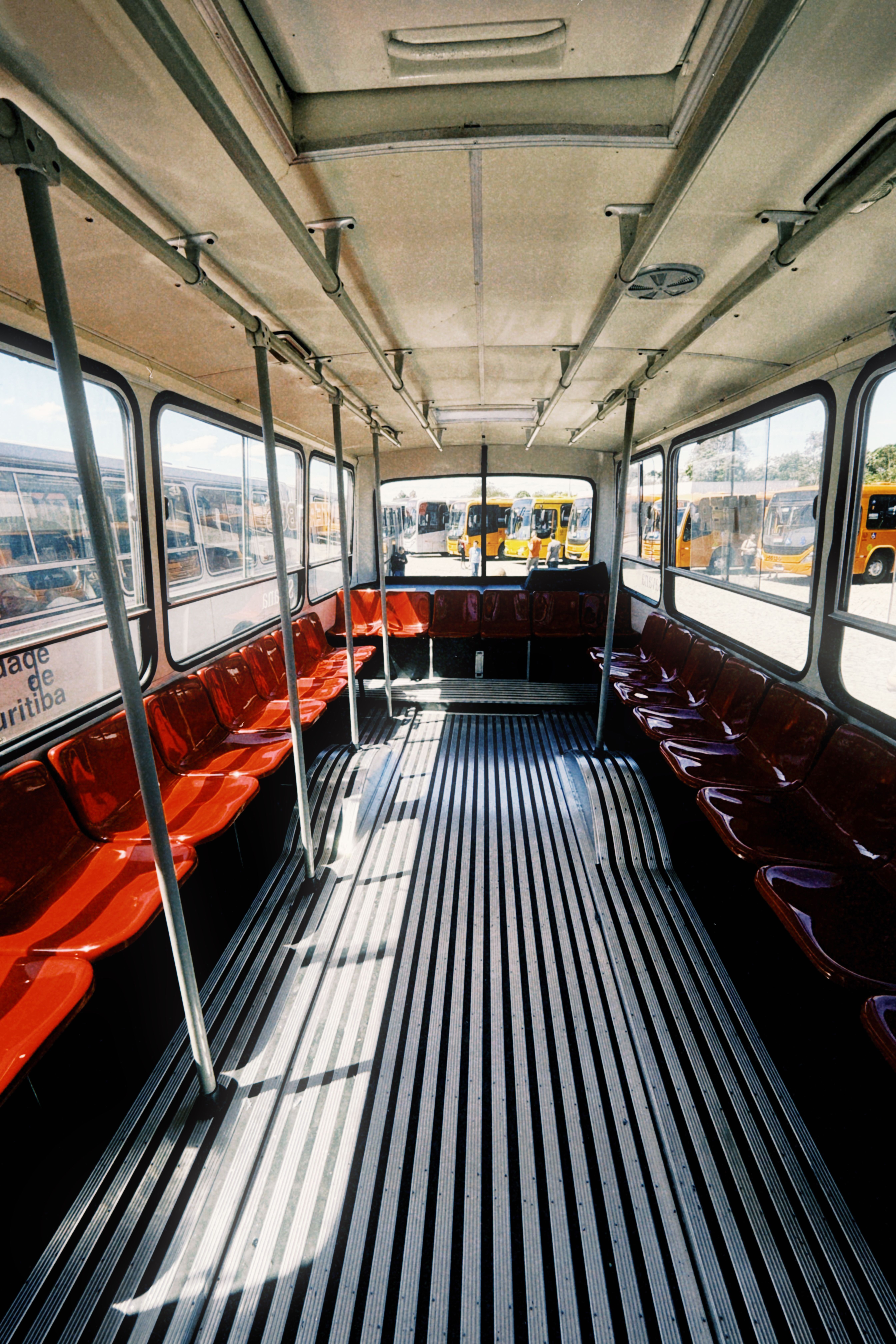 Interior of Empty Vintage City Bus with Red Seats · Free Stock Photo