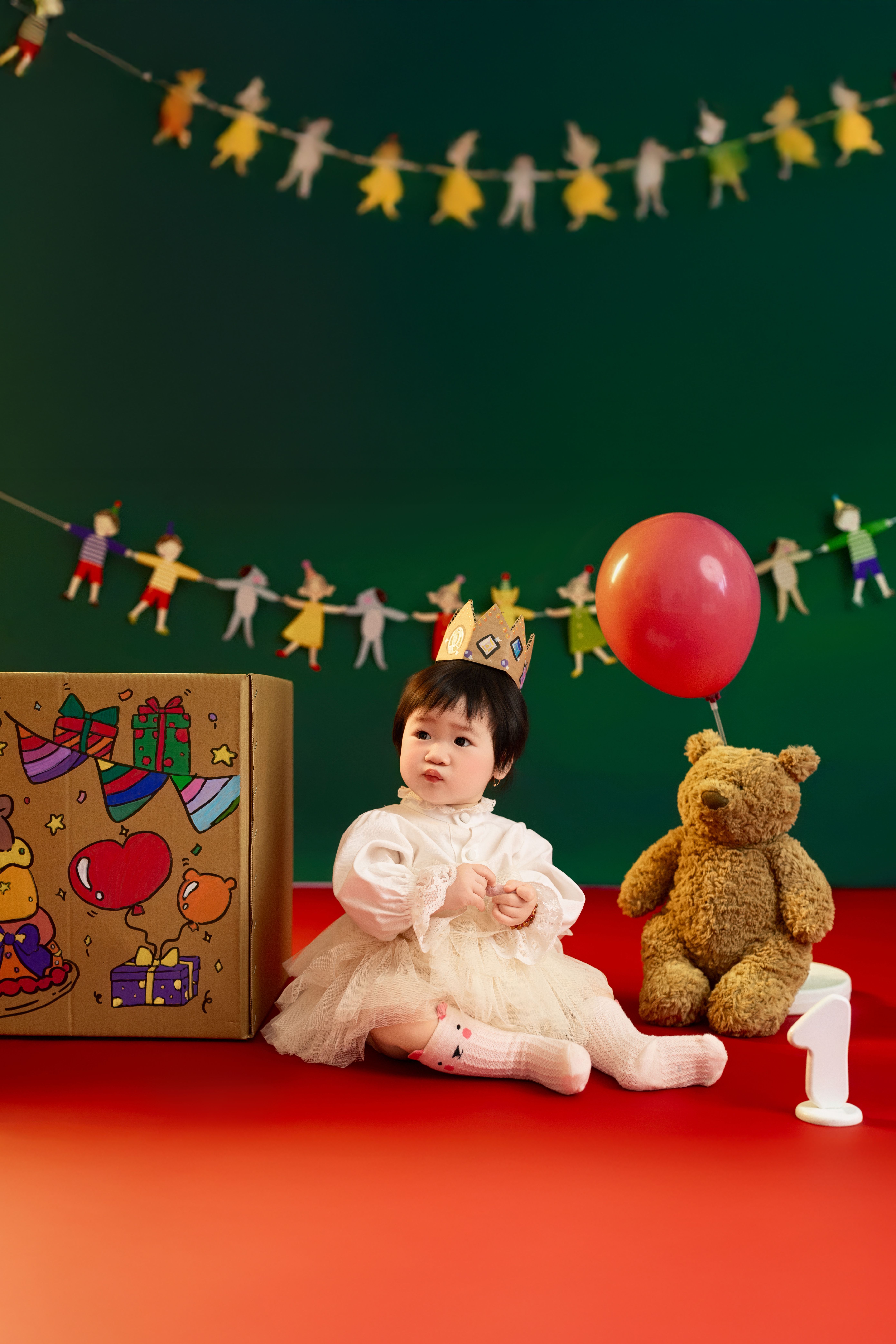 Adorable Baby with Birthday Decor and Teddy Bear · Free Stock Photo