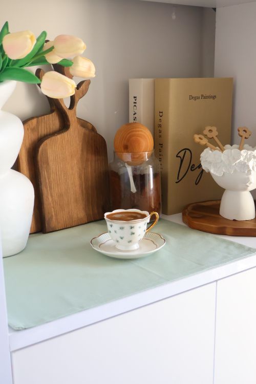Free Charming kitchen scene with coffee, books, and decor elements. Stock Photo