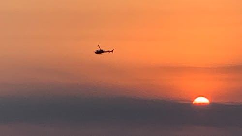 Foto profissional grátis de céu alaranjado, guatemala, helicóptero