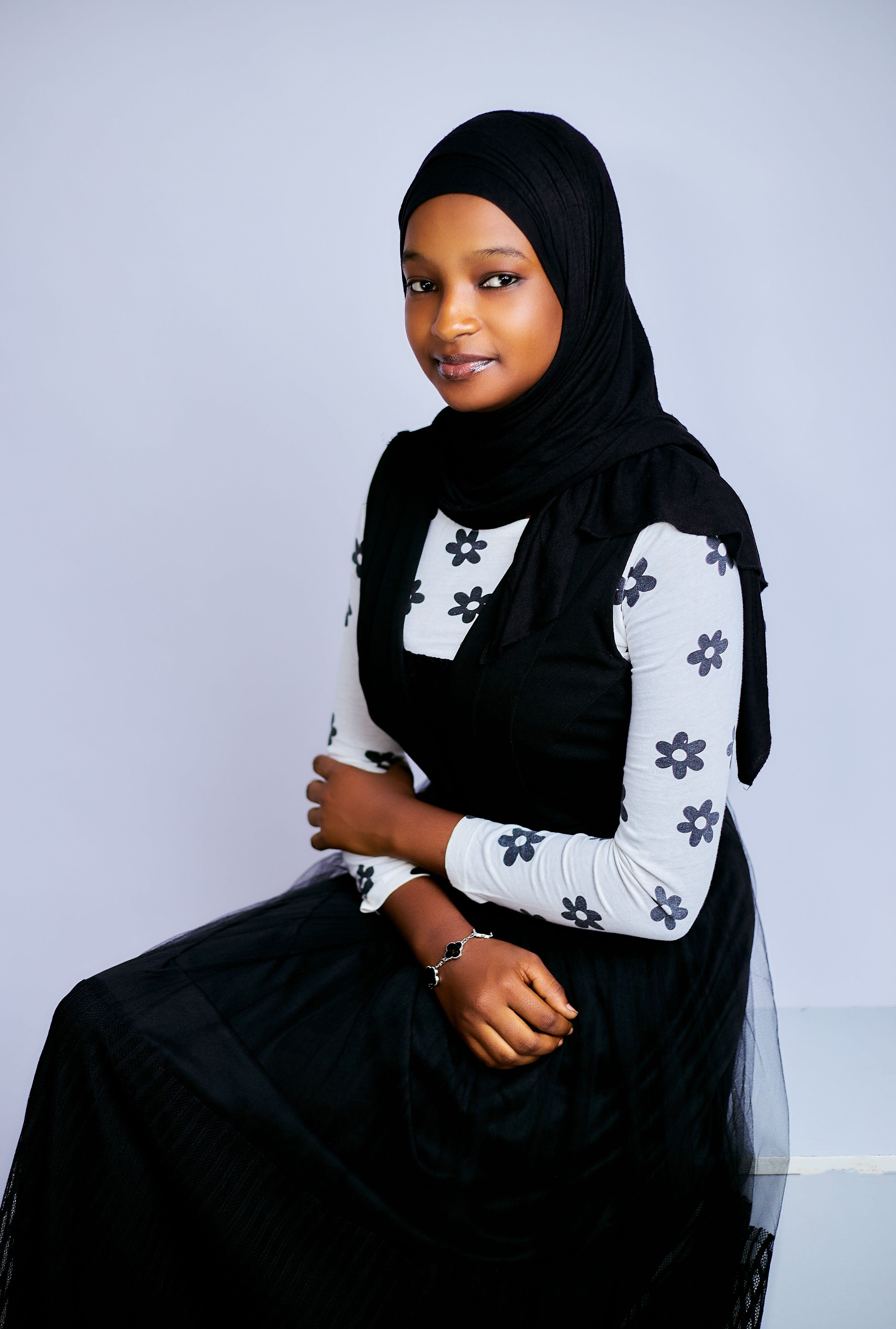 Elegant Portrait of a Young Woman in Black Hijab · Free Stock Photo