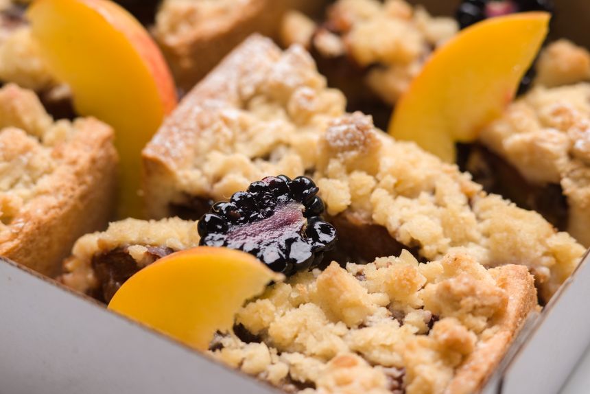 Peach and blackberry crumble bars — photo by Novkov Visuals on Pexels