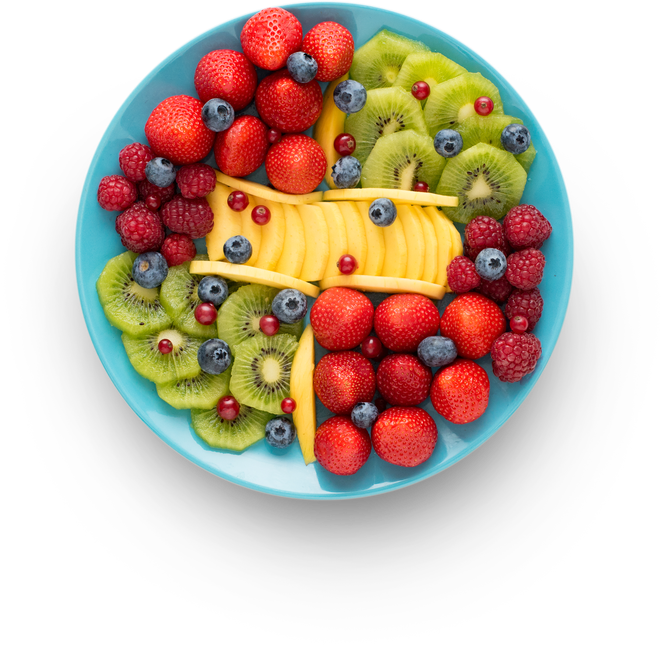 Vibrant plate of assorted fruits including berries, kiwi, and mango, perfect for healthy eating.