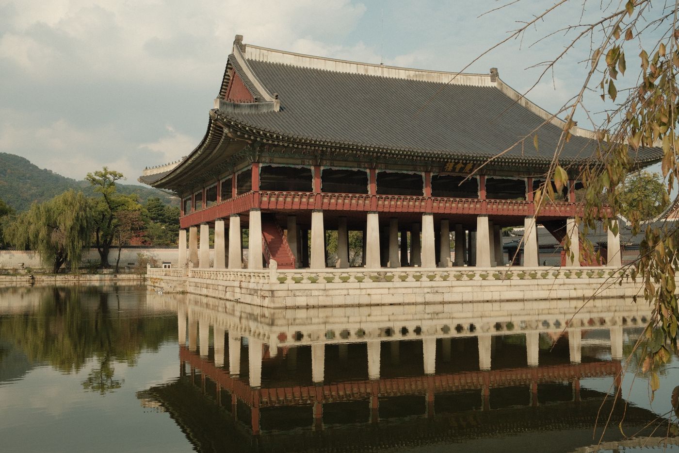 Pavilion at Gyeongbokgung Palace in Seoul reflected in still water
