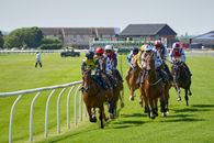 Exciting Horse Race at Musselburgh Racecourse · Free Stock Photo