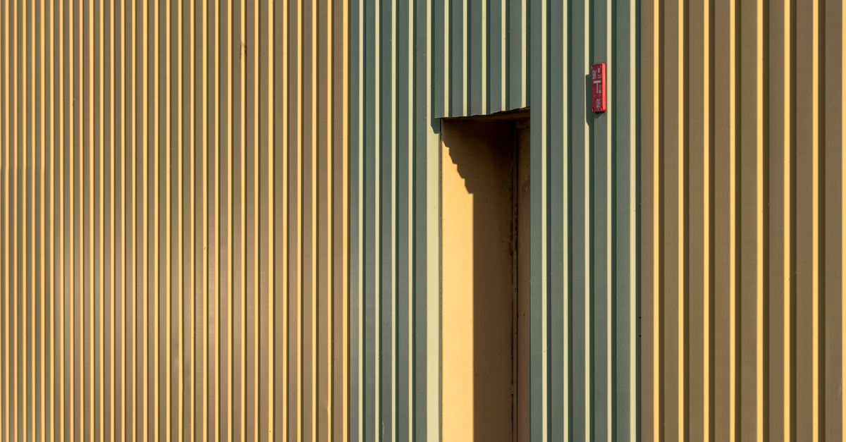 Yellow and Green Vertical Striped Wall with Door · Free Stock Photo