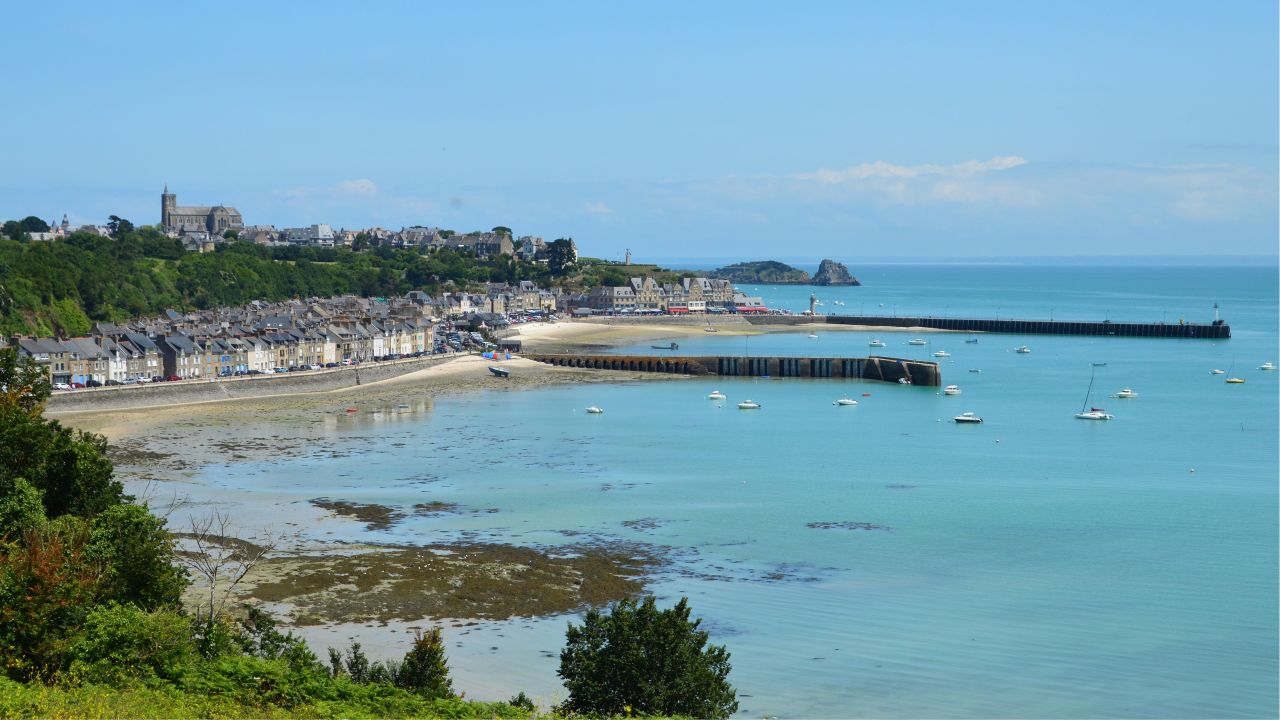 stunning coastal view of cancale bretagne with boats and a clear blue