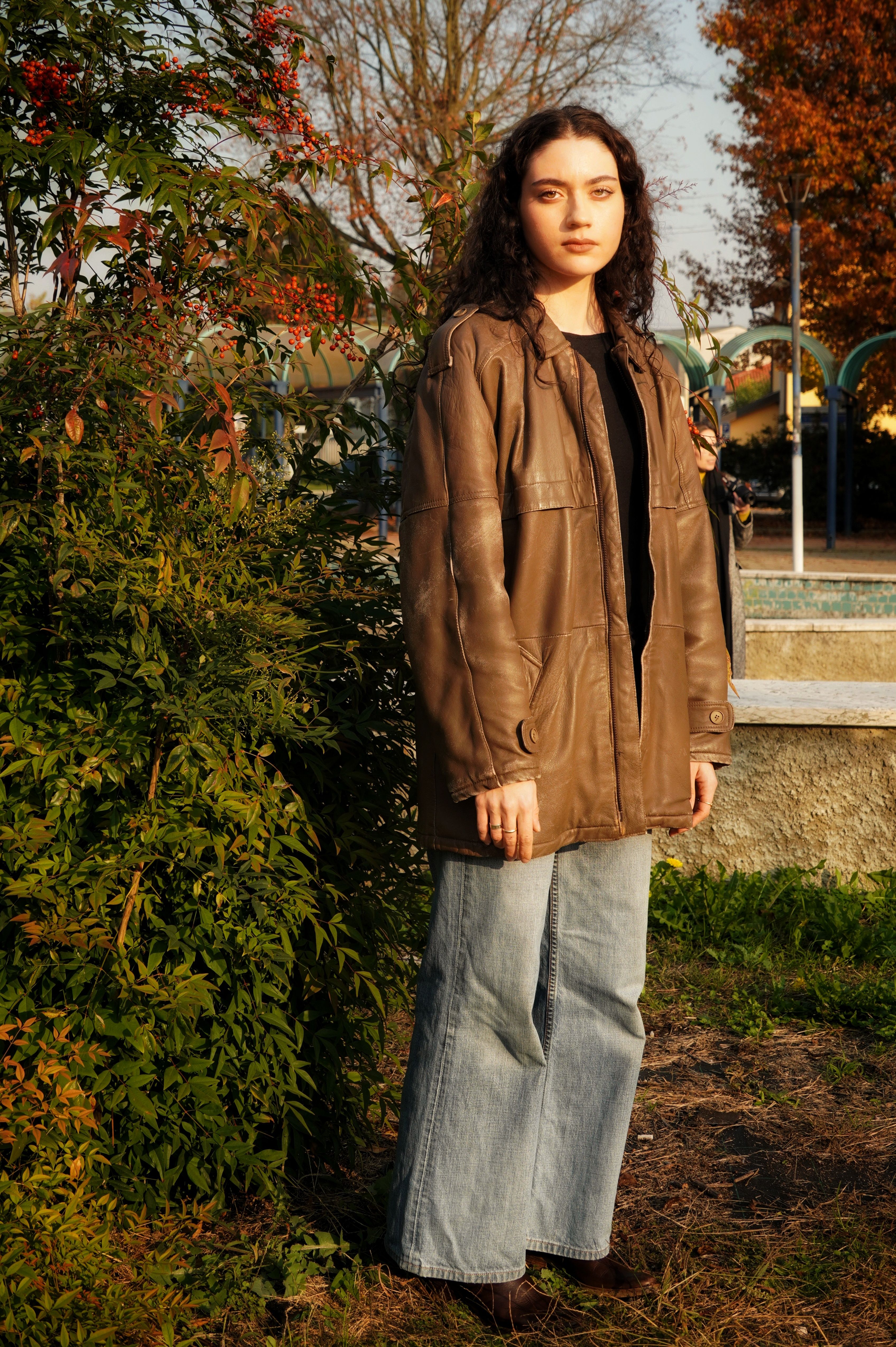 Portrait of Woman in Leather Jacket Outdoors · Free Stock Photo