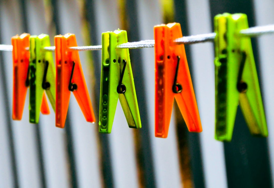 Vibrant Plastic Clothespins on Laundry Line · Free Stock Photo