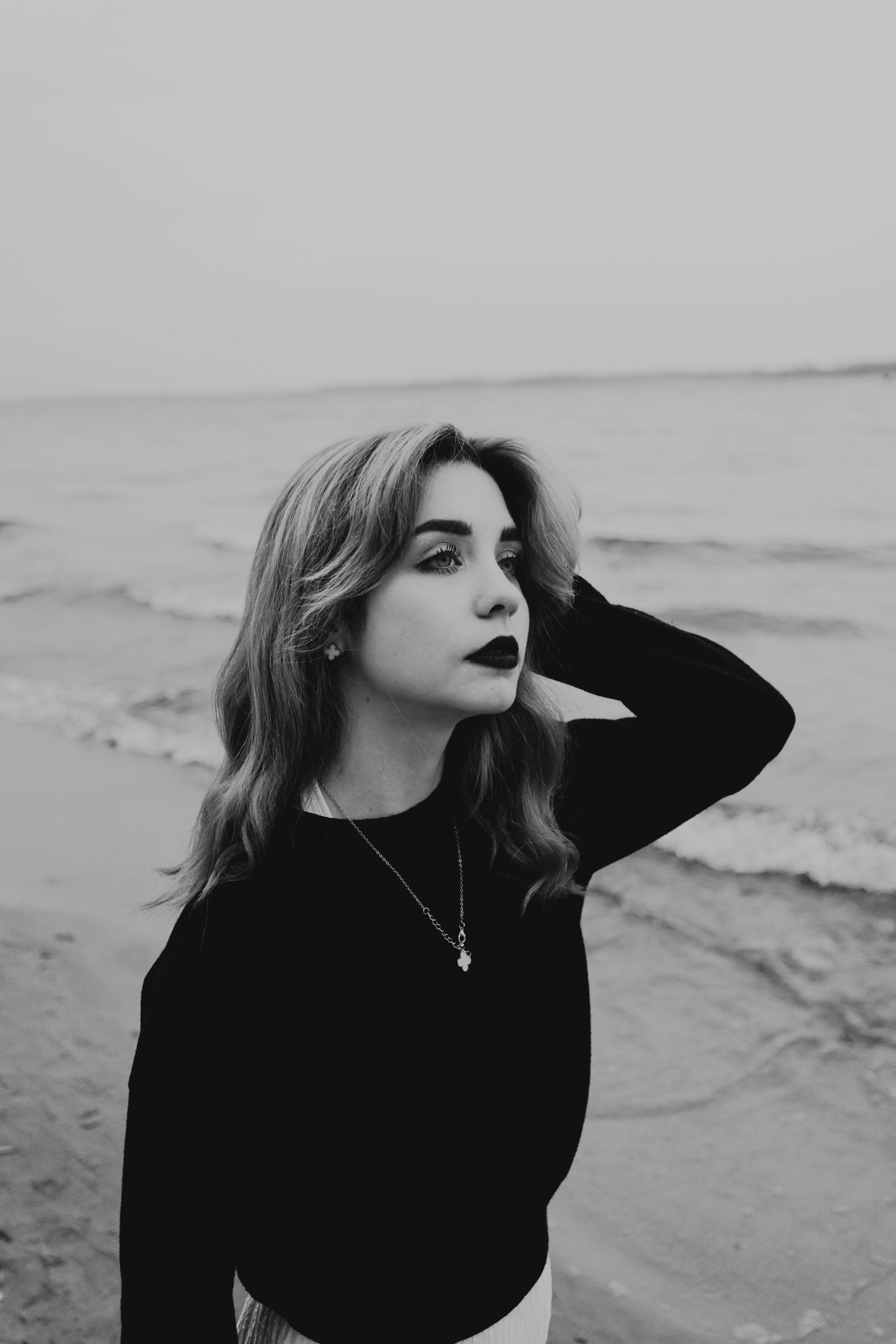 Black and White Beach Portrait of a Woman · Free Stock Photo