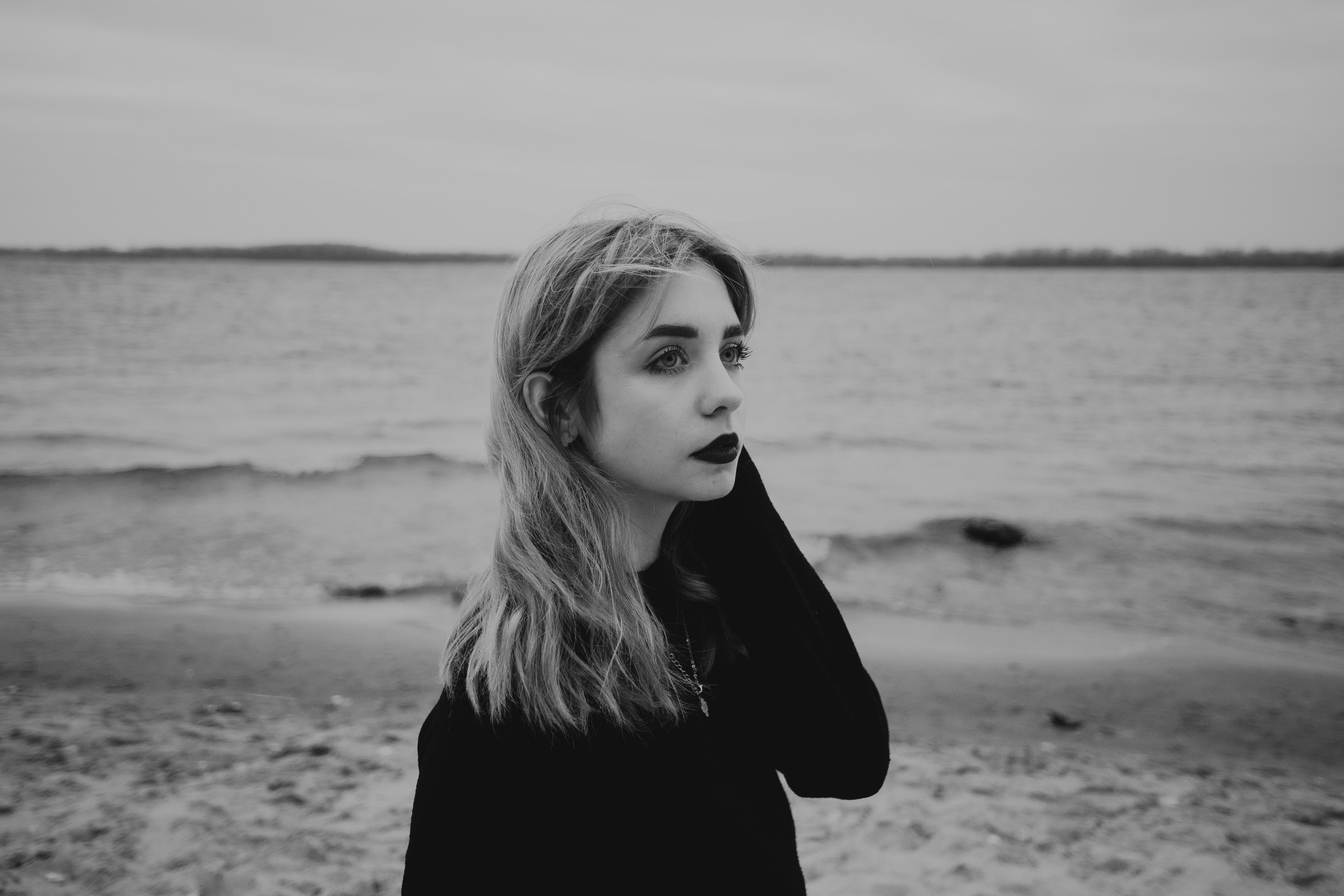 Black and White Portrait of Woman by the Sea · Free Stock Photo