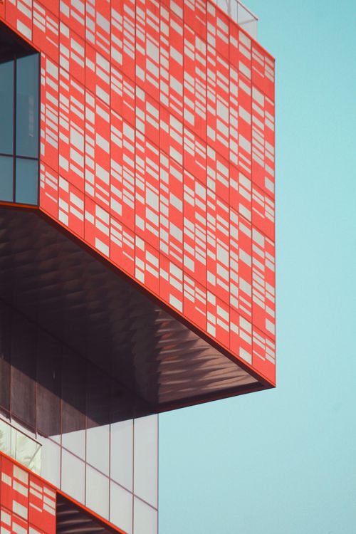 Modern Architectural Building with Colorful Facade · Free Stock Photo
