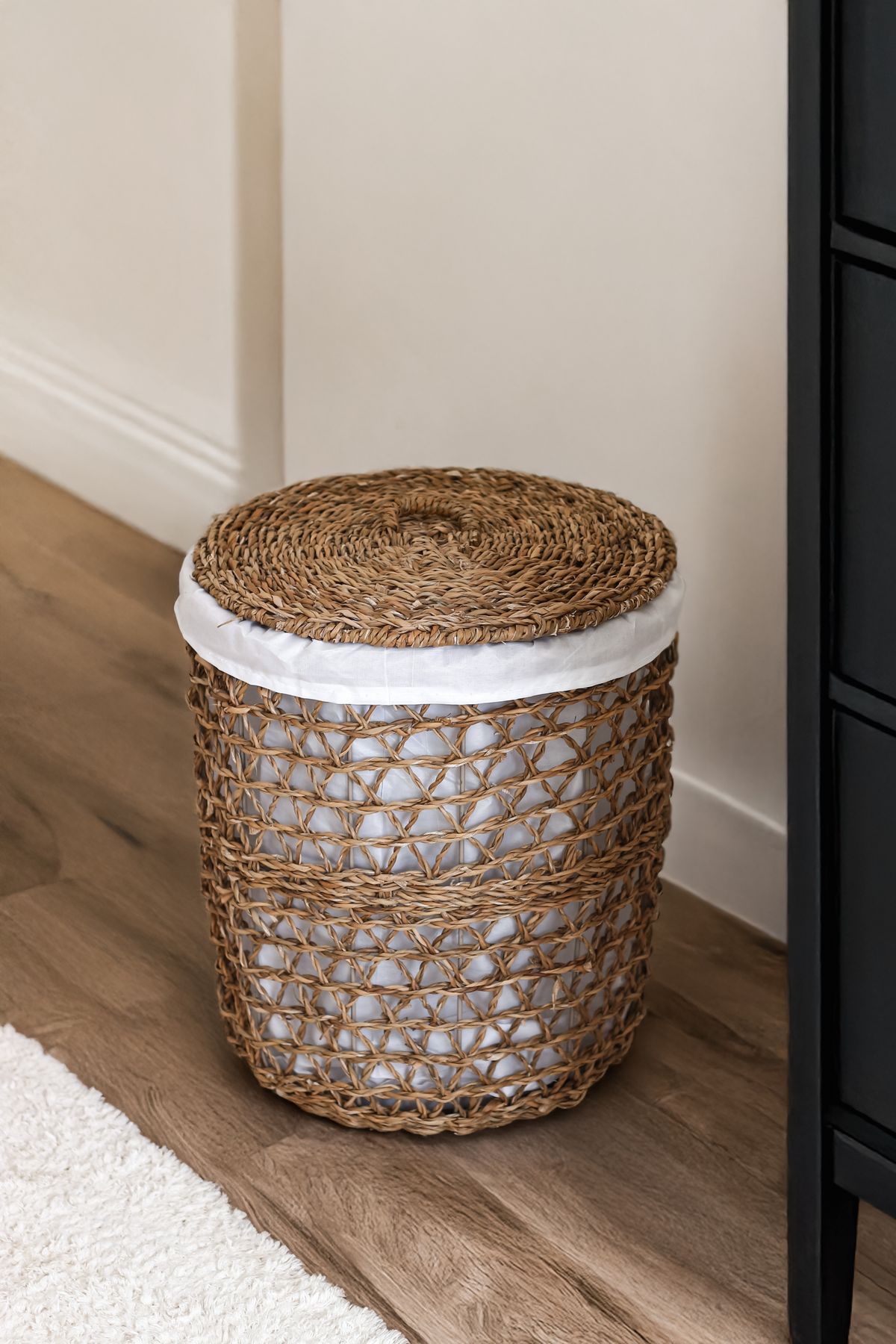 Warm modern living room with tidy woven storage baskets