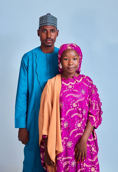Free Portrait of a couple in vibrant traditional African attire, showcasing cultural elegance. Stock Photo