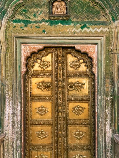 Free Intricate golden door with traditional motifs in Jaipur's City Palace, Rajasthan. Stock Photo