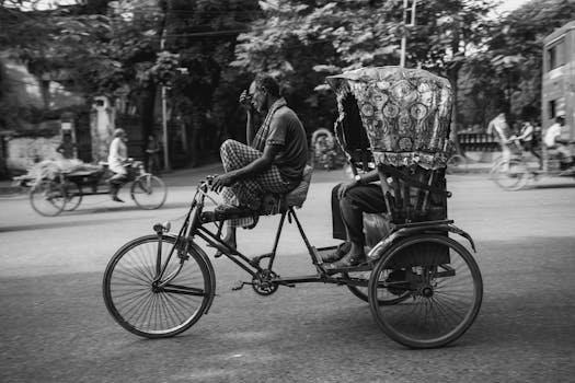 Candid street scene of a rickshaw in motion, capturing the essence of Dhaka's vibrant life.