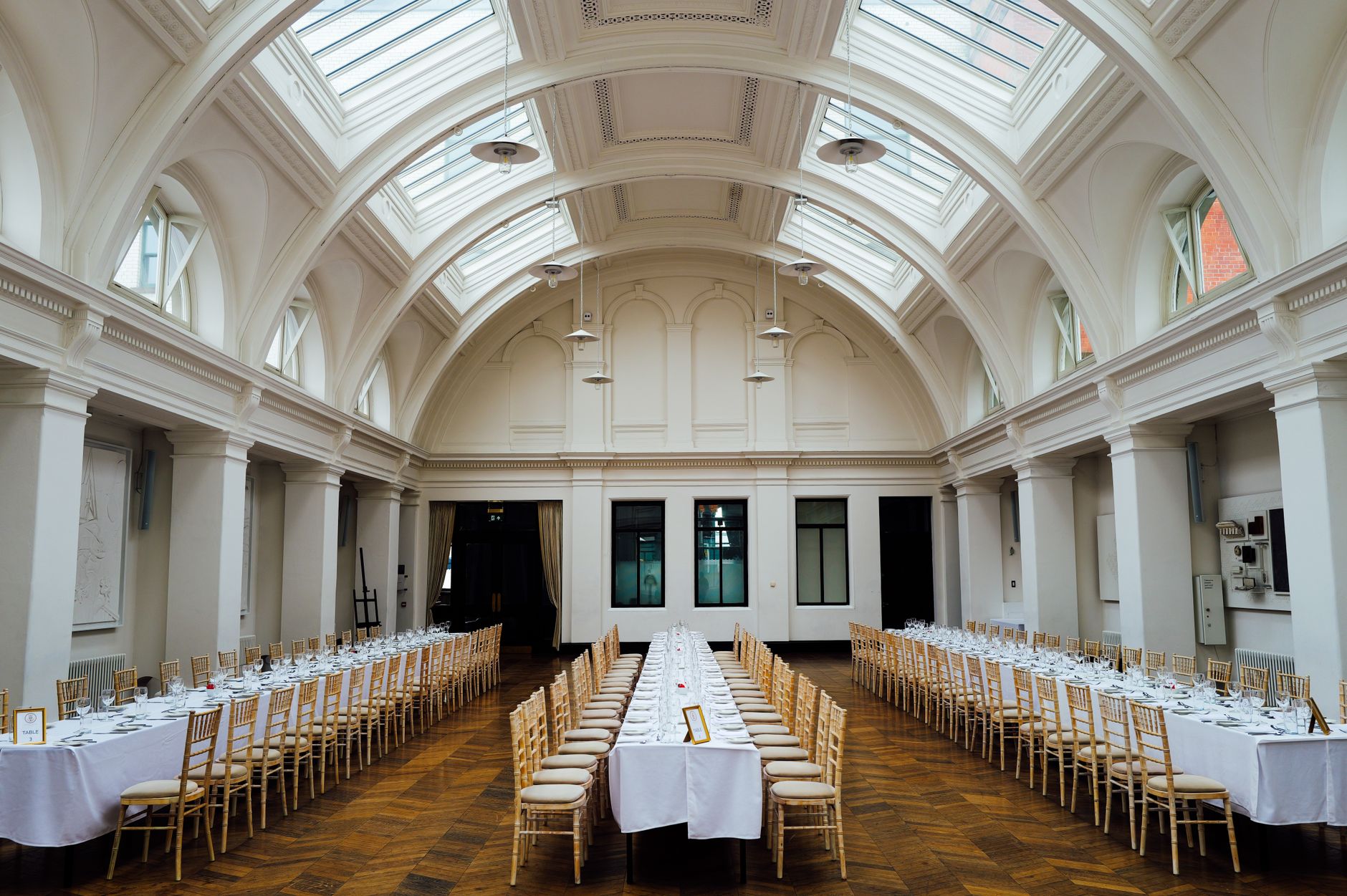 Guests entering an elegant international arts event in a historic cultural venue