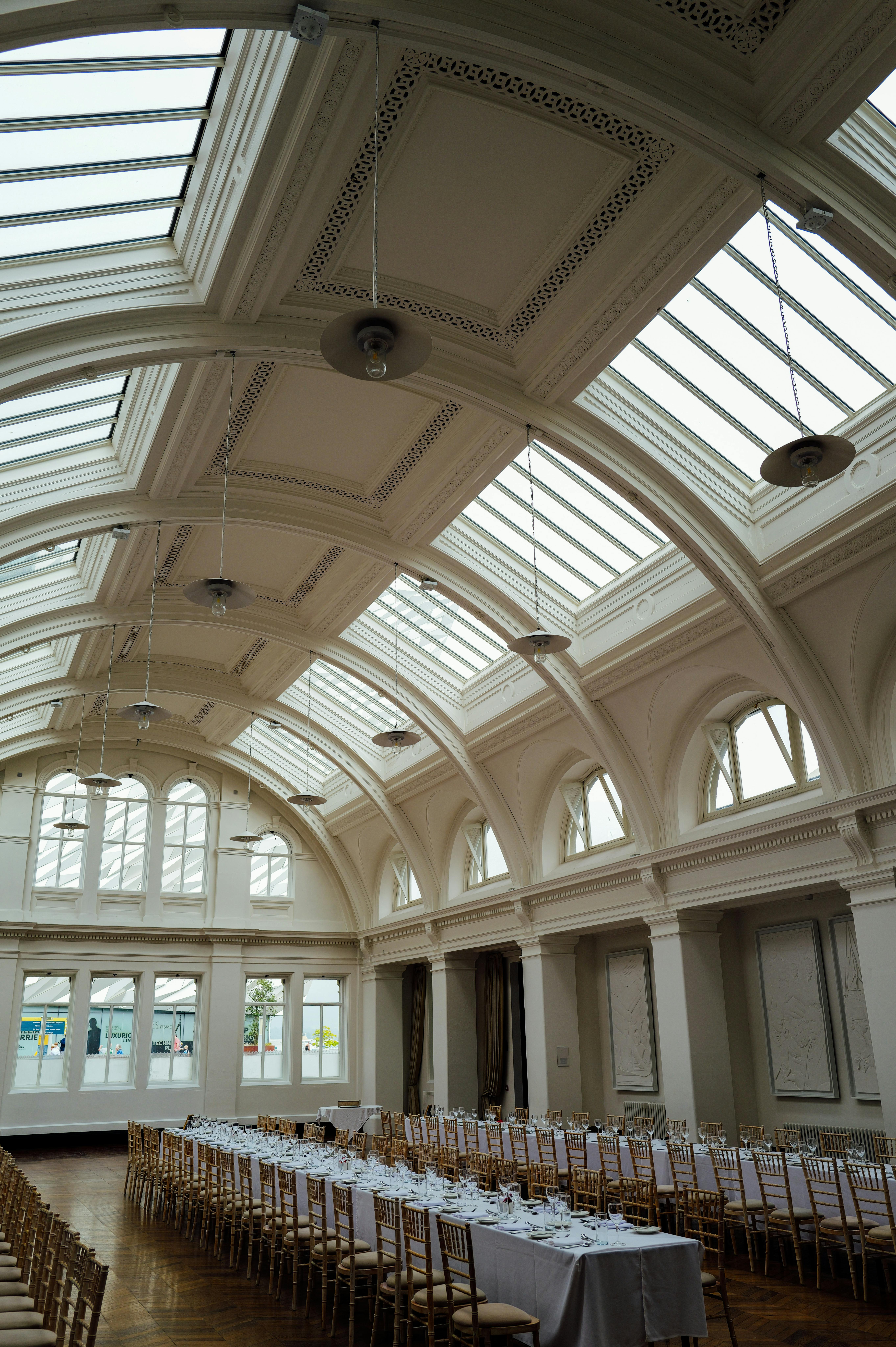 Elegant Banquet Hall with Skylight Ceiling · Free Stock Photo