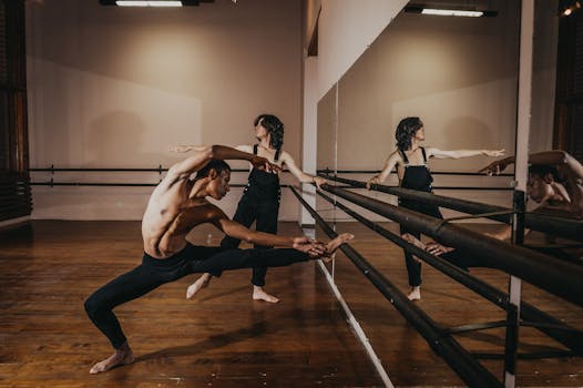 Man and Woman Warming Up on a Dance Room