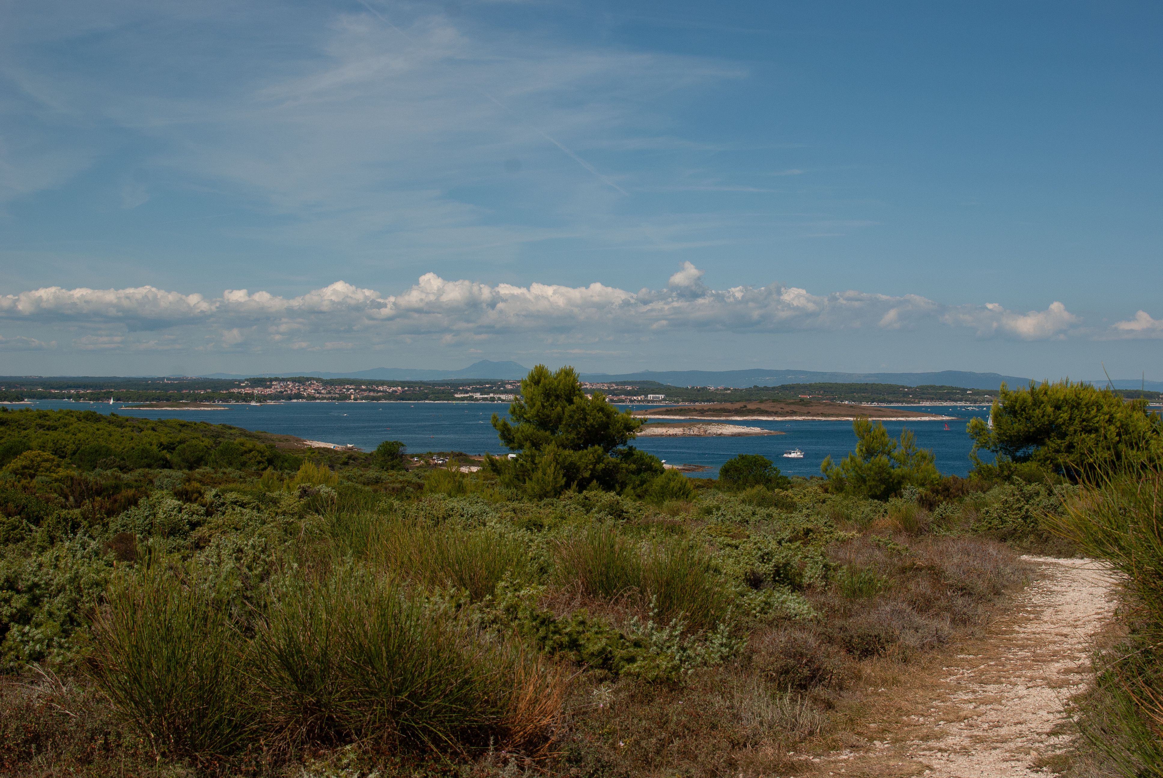 Scenic Coastal Landscape with Blue Waters · Free Stock Photo