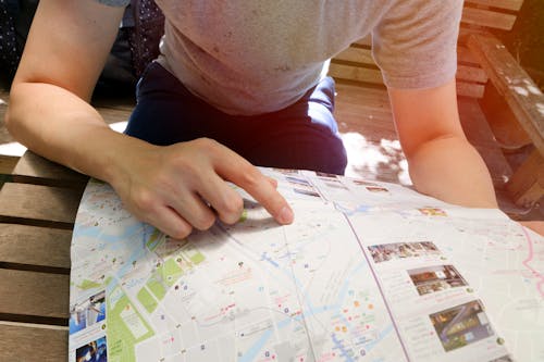 Person Holding Map