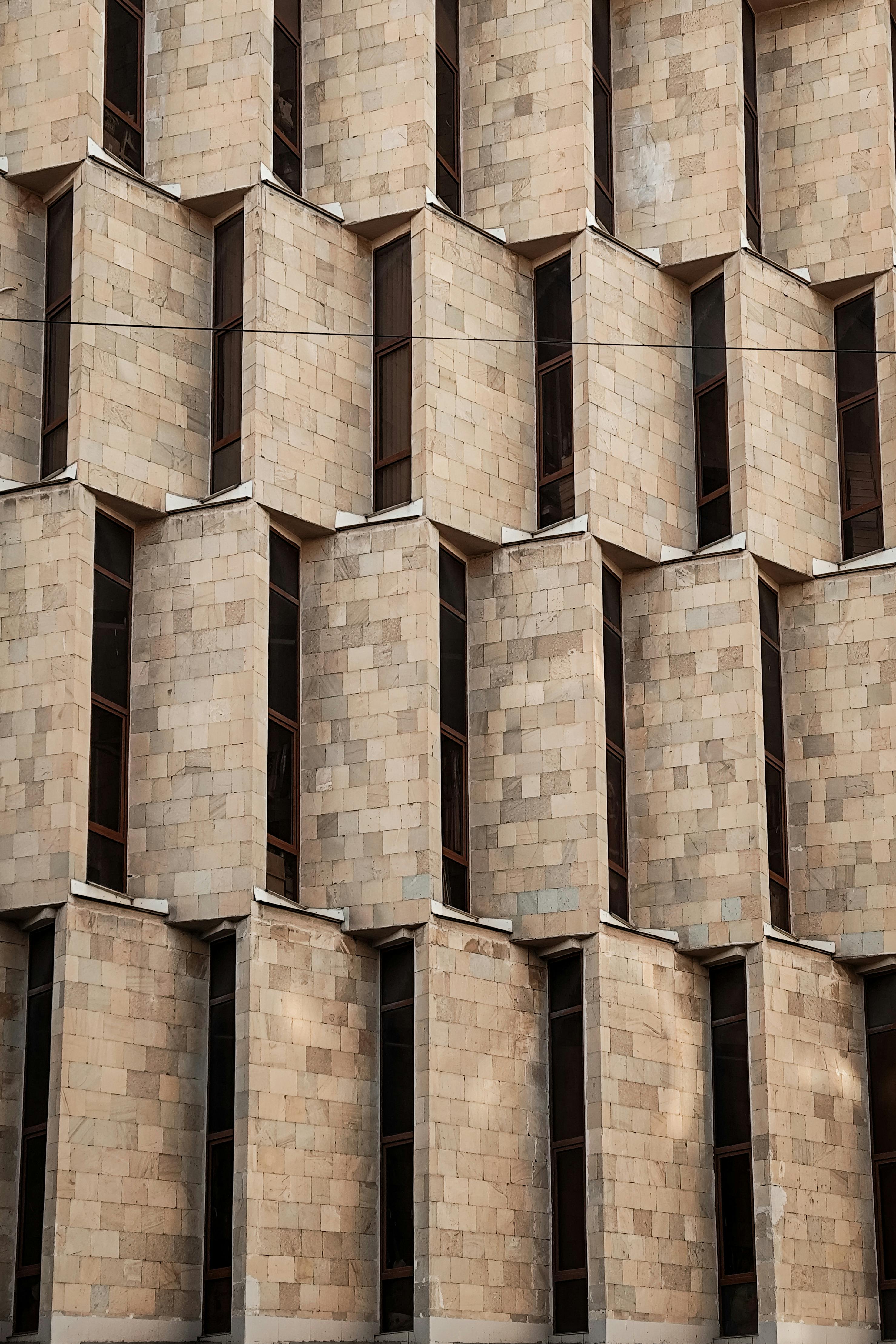 Close-up of a geometric building facade in Yerevan, Armenia, showcasing modern architecture.