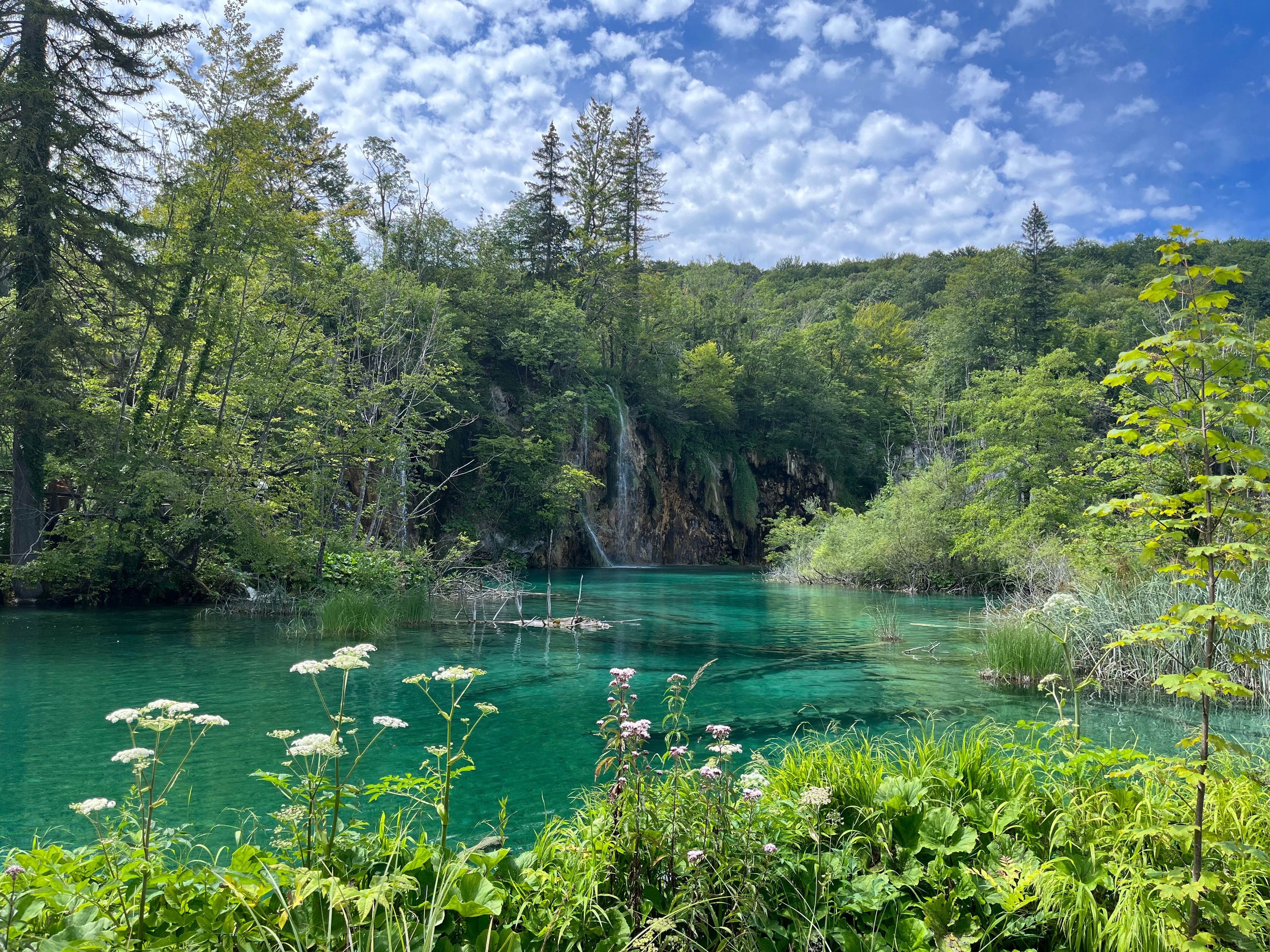 Cascading turquoise waterfalls at Plitvice Lakes National Park, Croatia