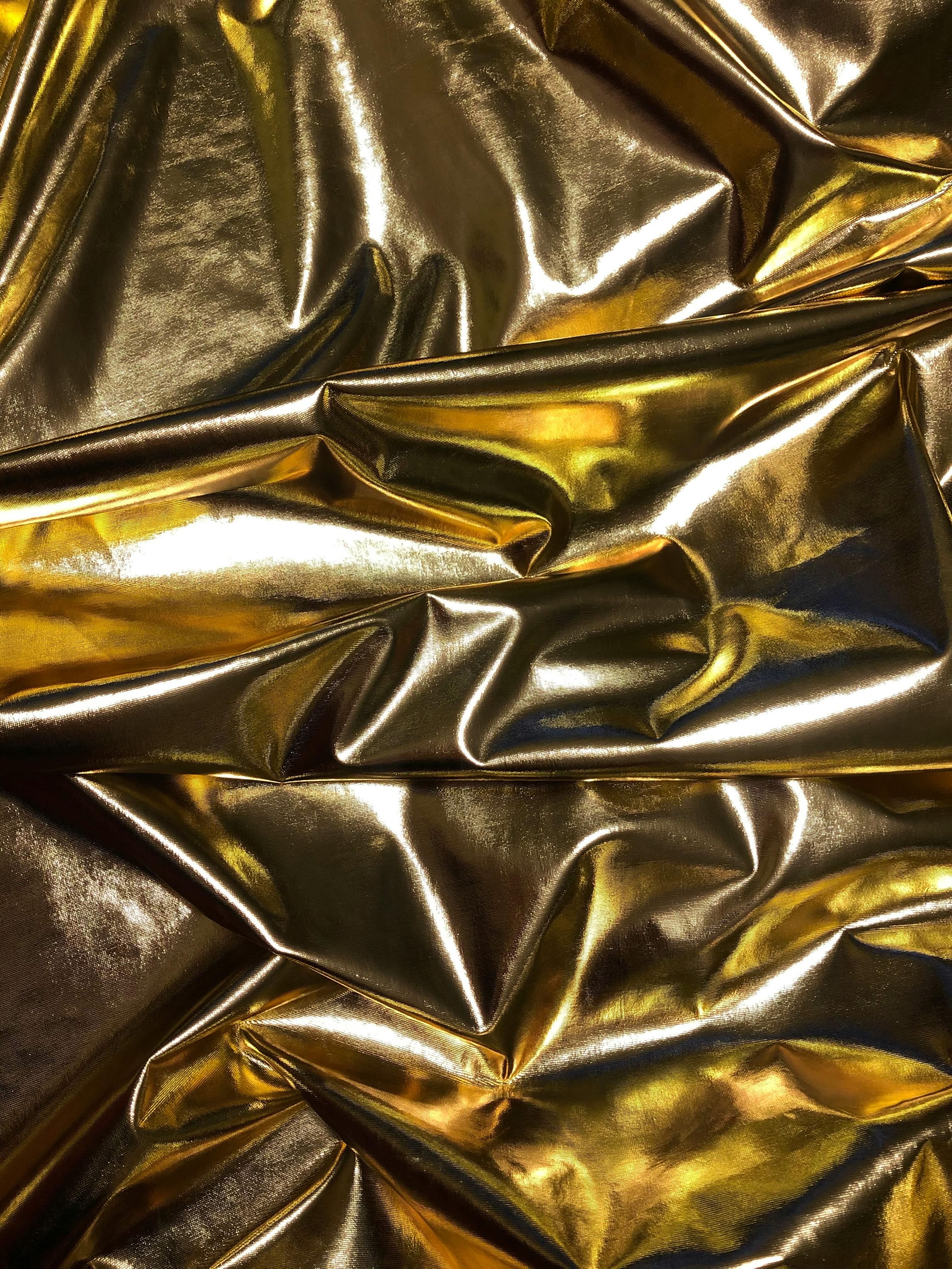 close up photo of gold textile