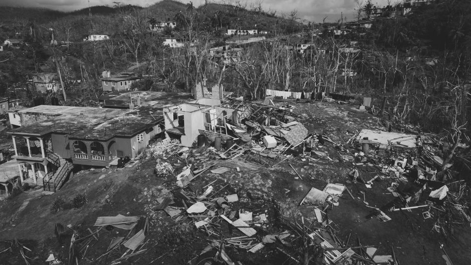 Aerial view of hurricane damage in St. James Parish, Jamaica, showing destroyed homes.