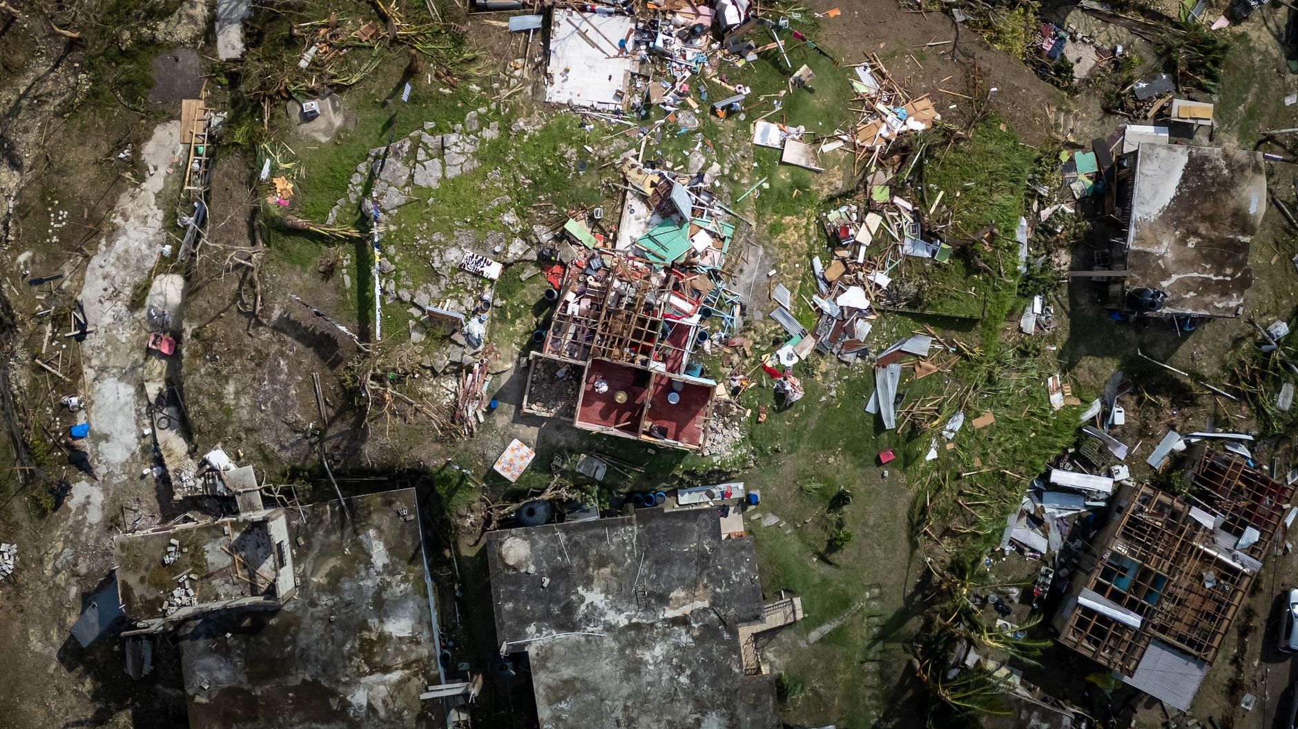Photo by Aviz Media Aerial photograph showing severe structural damage after a hurricane.