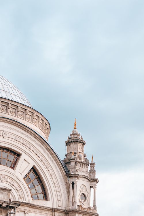 Free Elegant and classic dome with tower against a serene sky in Istanbul. Stock Photo
