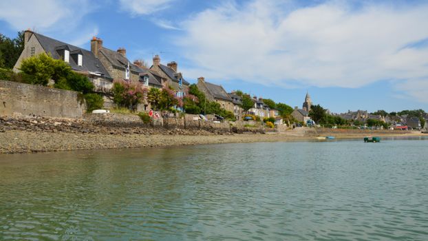 Scenic view of Saint-Suliac's beautiful houses along the coast in Brittany, France.