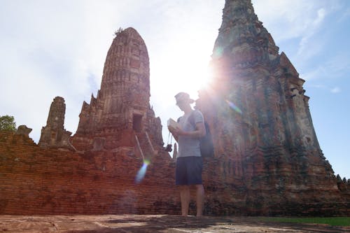 Man Standing in Front of Angkor Wat, Cambodia