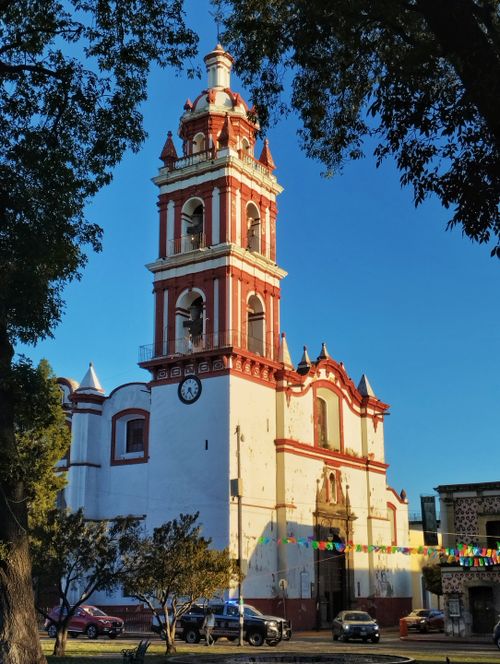 Free Beautiful historic church in Puebla, Mexico, captured at sunset showcasing vibrant architecture. Stock Photo